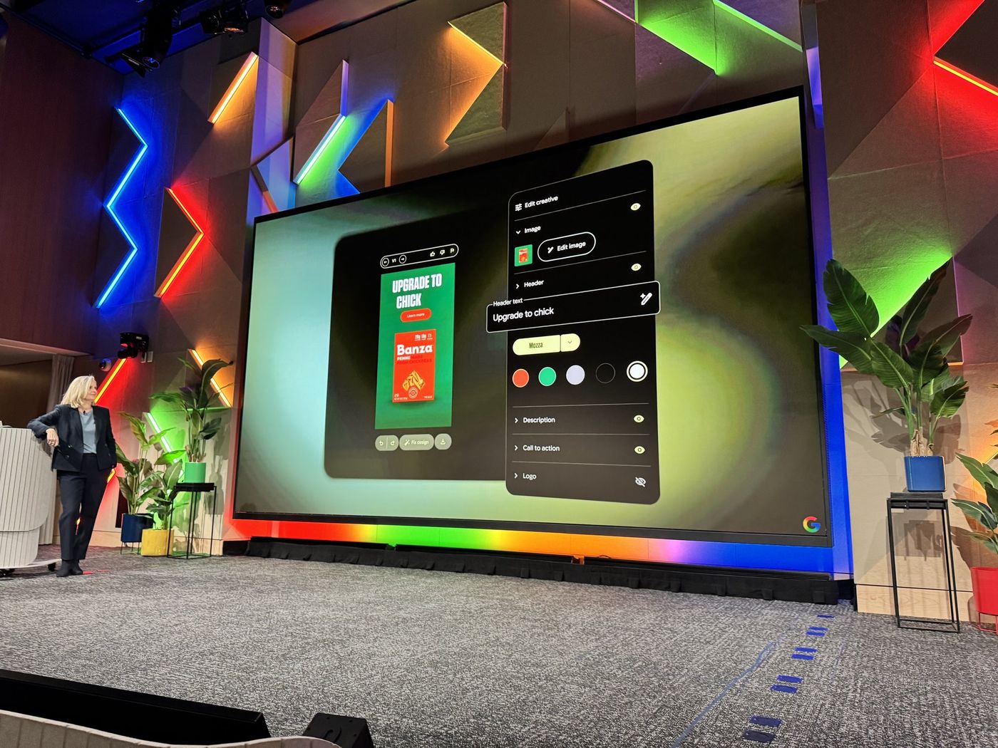 Presenter showing AI design tools on the main stage