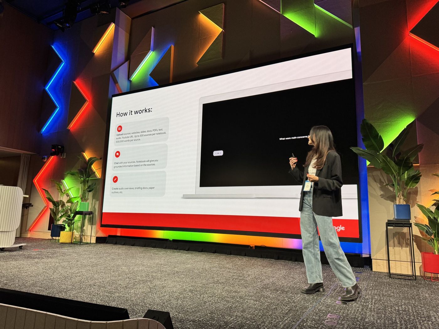 Speaker presenting a live demo on stage